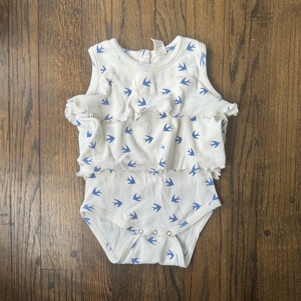 Kate Quinn ruffle bodysuit and headband